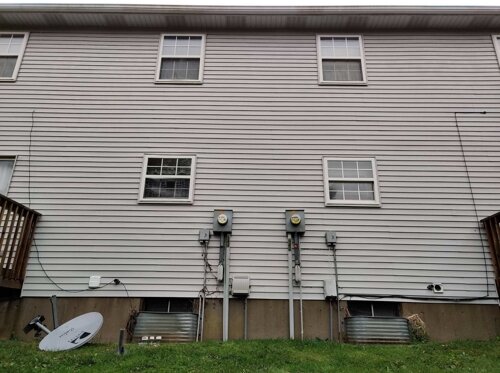 Home siding after pressure washing