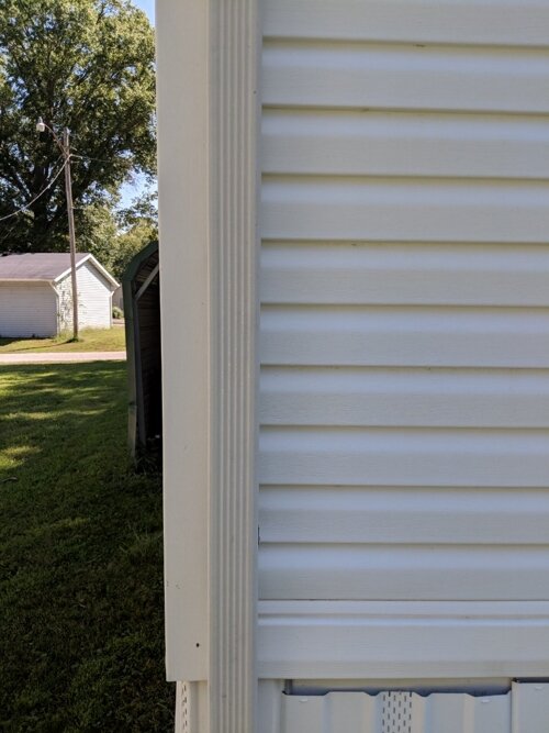 Home siding after pressure washing