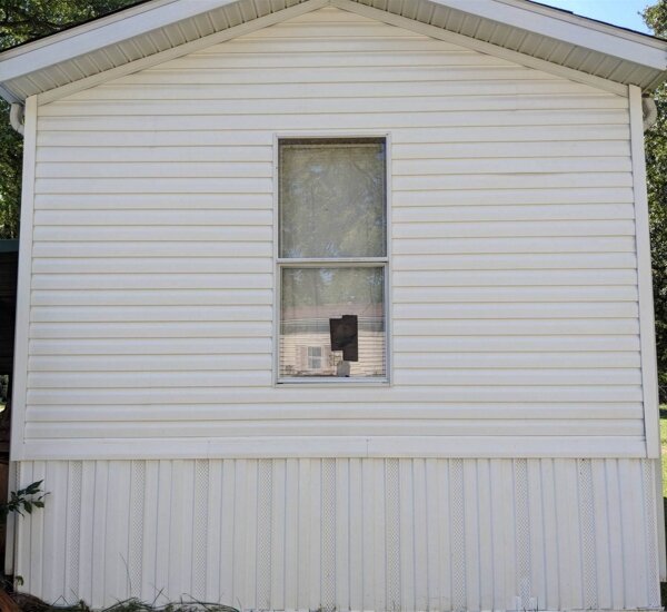 Home siding after pressure washing